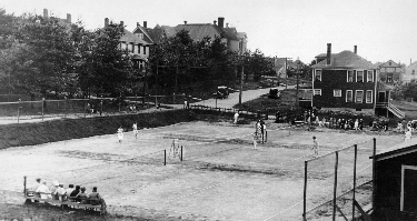 [tennis courts in Canso] /></CENTER>
</p><p>As was mentioned earlier, the Western Union for a time left Canso for Sydney with only one technician left behind to maintain the lines.  This situation did not continue for long and in 1923 a major expansion was undertaken by the company and twelve fine new homes were constructed, eleven on Carleton Terrace, and a Superintendent's home across the street from the cable office.  These large two and one half story homes were all built from the same plans with the exception of the Superintendent's home, which was larger and included a garage.  Seven homes were on the east side of the Terrace with four facing them on the west side.  An older structure called the Sailor's Rest was relocated from Union Street overlooking the water, to an area at the back of Carleton Terrace and used by the employees as a clubhouse.  Recreation was available to the Western Union staff: a curling rink was in operation in the winter months, and tennis courts were located in the same area.  Curling bonspiels and tennis matches were quite common between the employees of the two cable companies.

</p><p><img src=ccstaff.gif hspace=10 align=left alt=